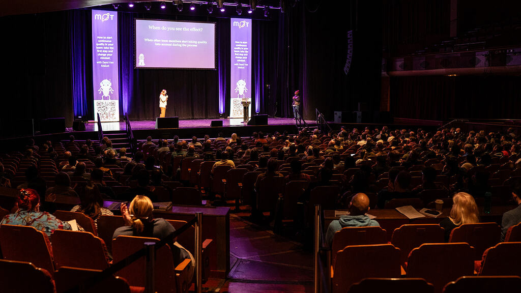 Back of the auditorium with Demi image