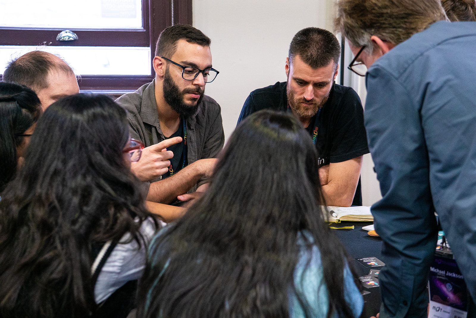 People gathered around a Riskstorming and AI session.