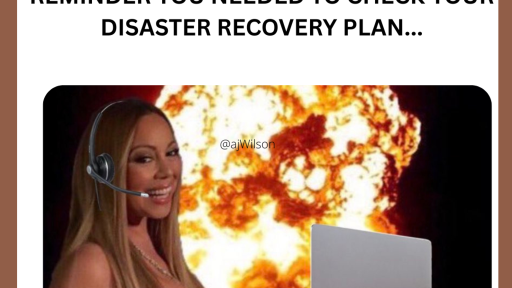 Image of grinning Mariah Carey with a headset on in front of a laptop with the world behind her burning.