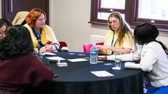 People gathered around a Riskstorming and AI session.

Comment if you see someone we should tag in this photo. image