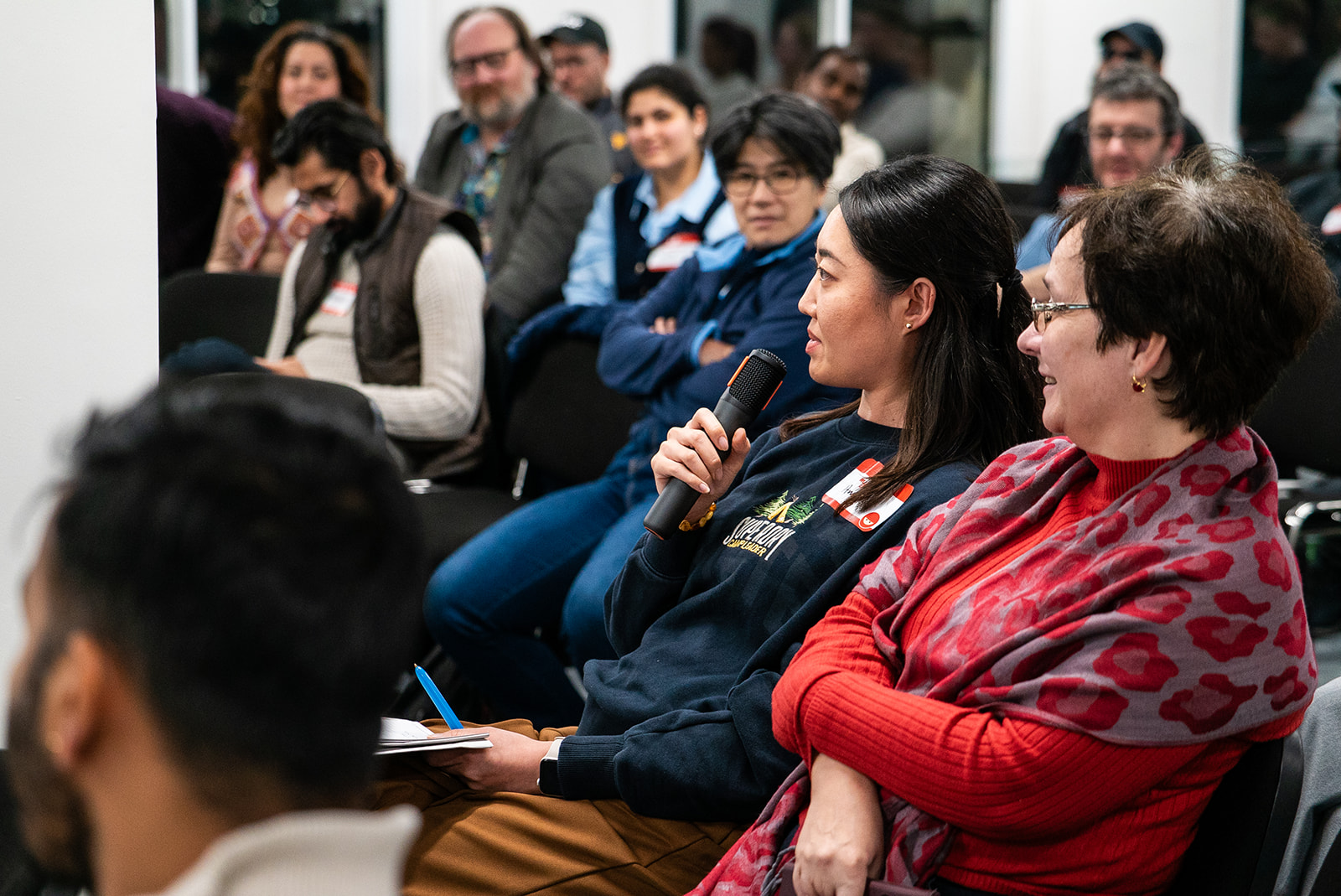 A member of the audience asking a question.