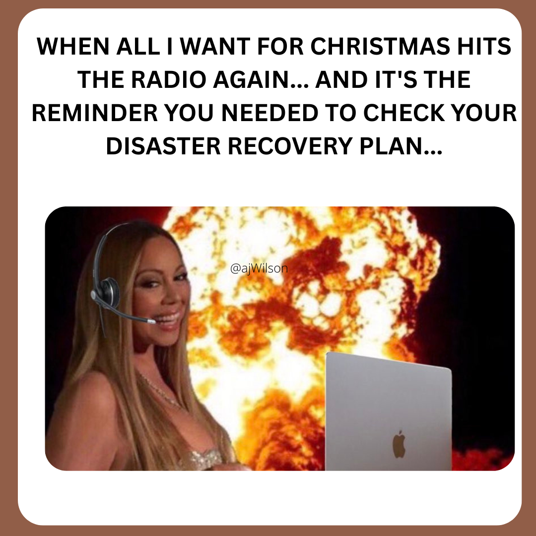 Image of grinning Mariah Carey with a headset on in front of a laptop with the world behind her burning.