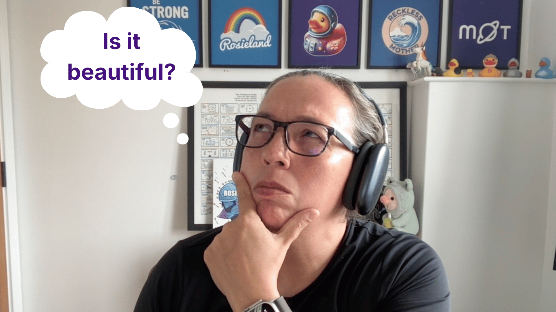 Rosie thinking, as a photo, with bubble text saying 'is it beautiful?' image