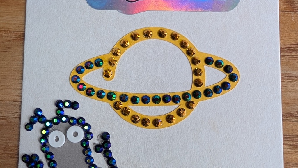 Coaster with rhinestoned bug and MoTaCon logo image