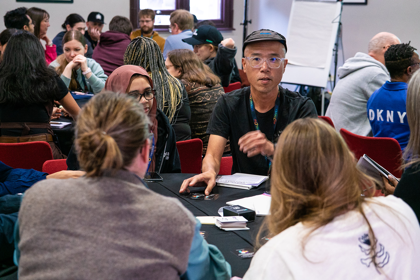 People gathered around a Riskstorming and AI session