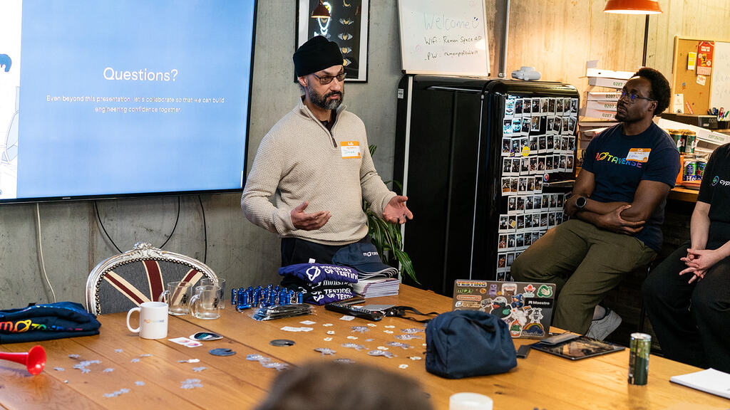 A photo of Dalbir Sehmbi delivering a great 99 second talk at MoT London image