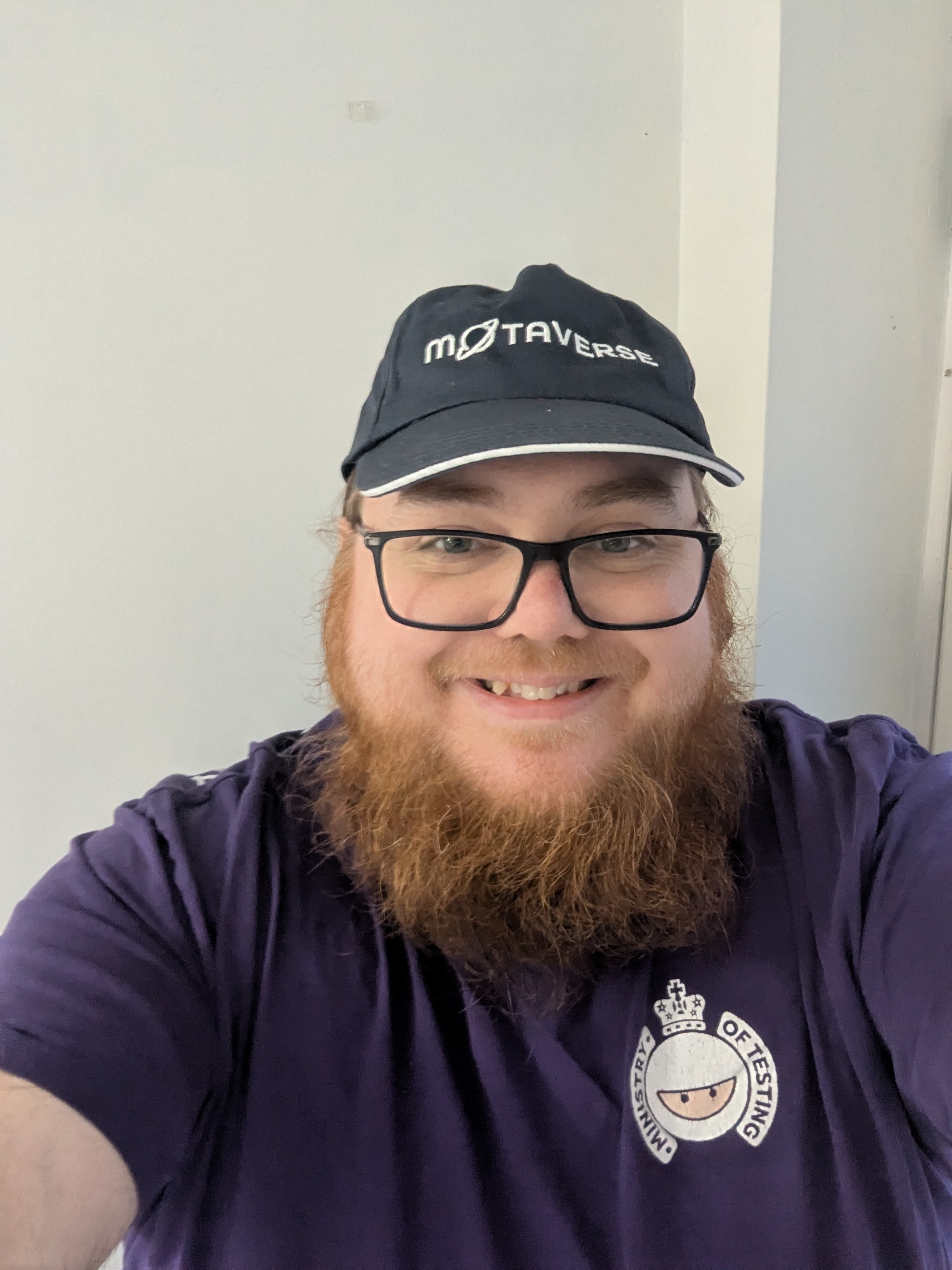 Ben in MoTaverse cap and purple test bash t-shirt  image