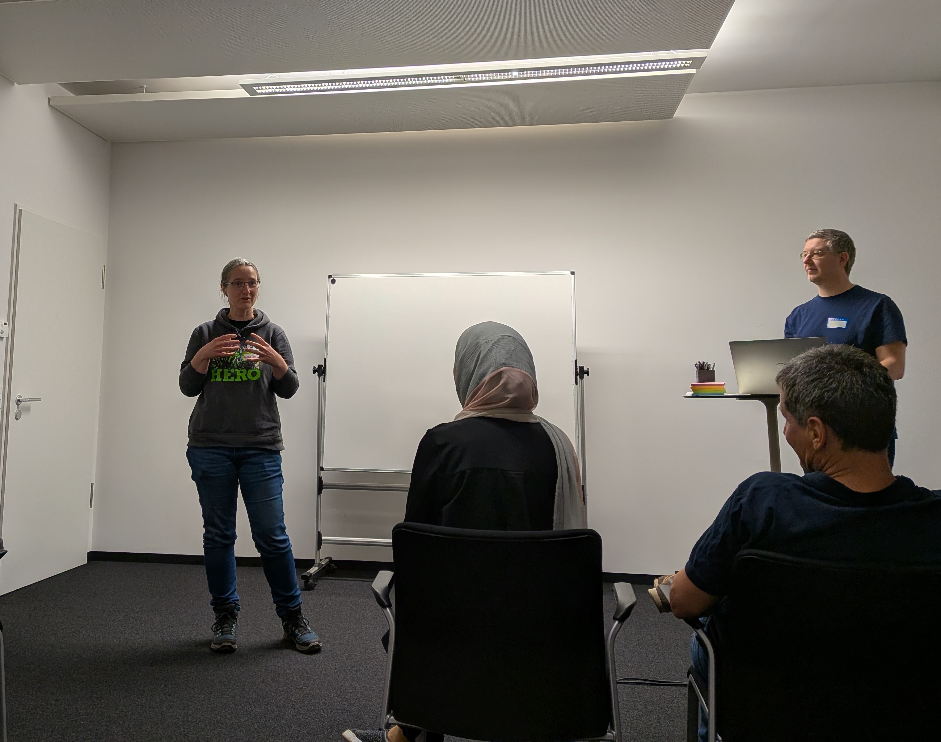 Gabrijela and the Munich meetup attendees discuss topics for the open space. 