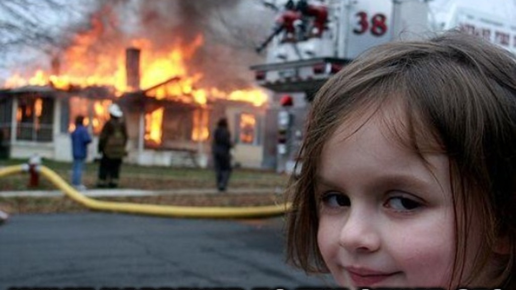 
The image is a meme featuring a young girl smirking in the foreground, with a house on fire and a fire engine in the background. The fire engine has the number "38" visible on its side.

Text at the top of the image reads: "THE FIRE ENGINE NUMBER IS 38"
Text at the bottom of the image reads: "WHAT HAPPENED TO THE OTHER 37?"
