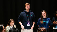 Robbie Falck and Grace Marsey from MoneyBox presenting at MoTaCon image