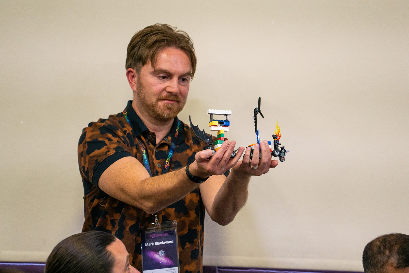 Mark Blackwood holds up a lego model