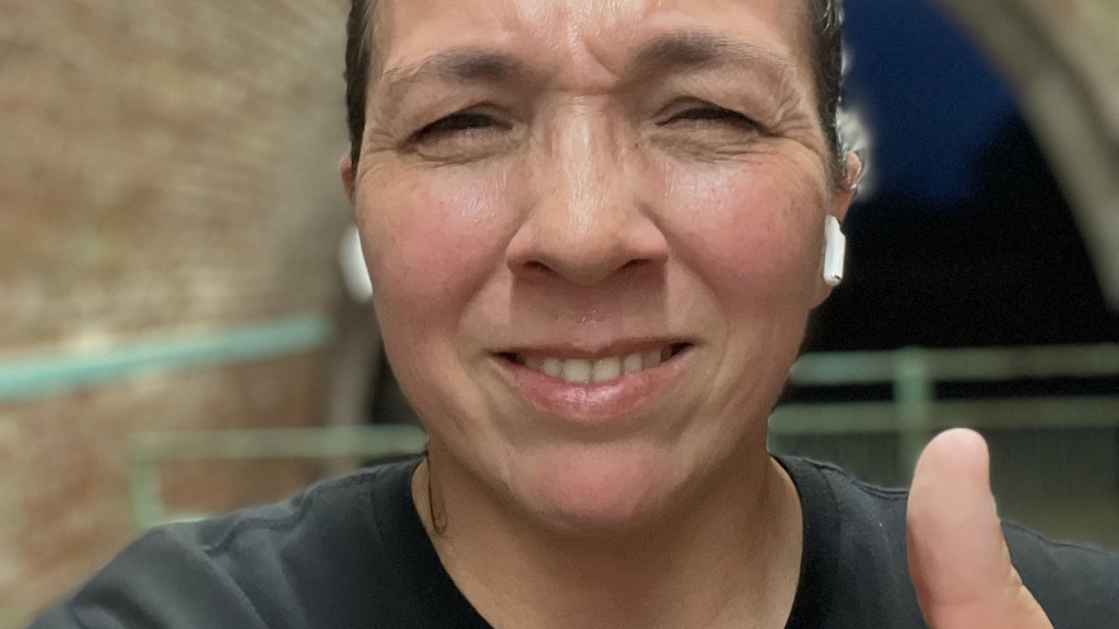 Selfie of Rosie after a run with her thumbs up. image