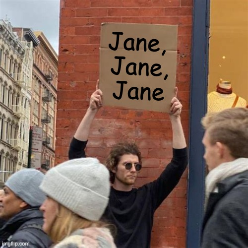 A man holding a cardboard sign that says "Jane, Jane, Jane"