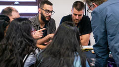 People gathered around a Riskstorming and AI session.

Comment if you see someone we should tag in this photo. image
