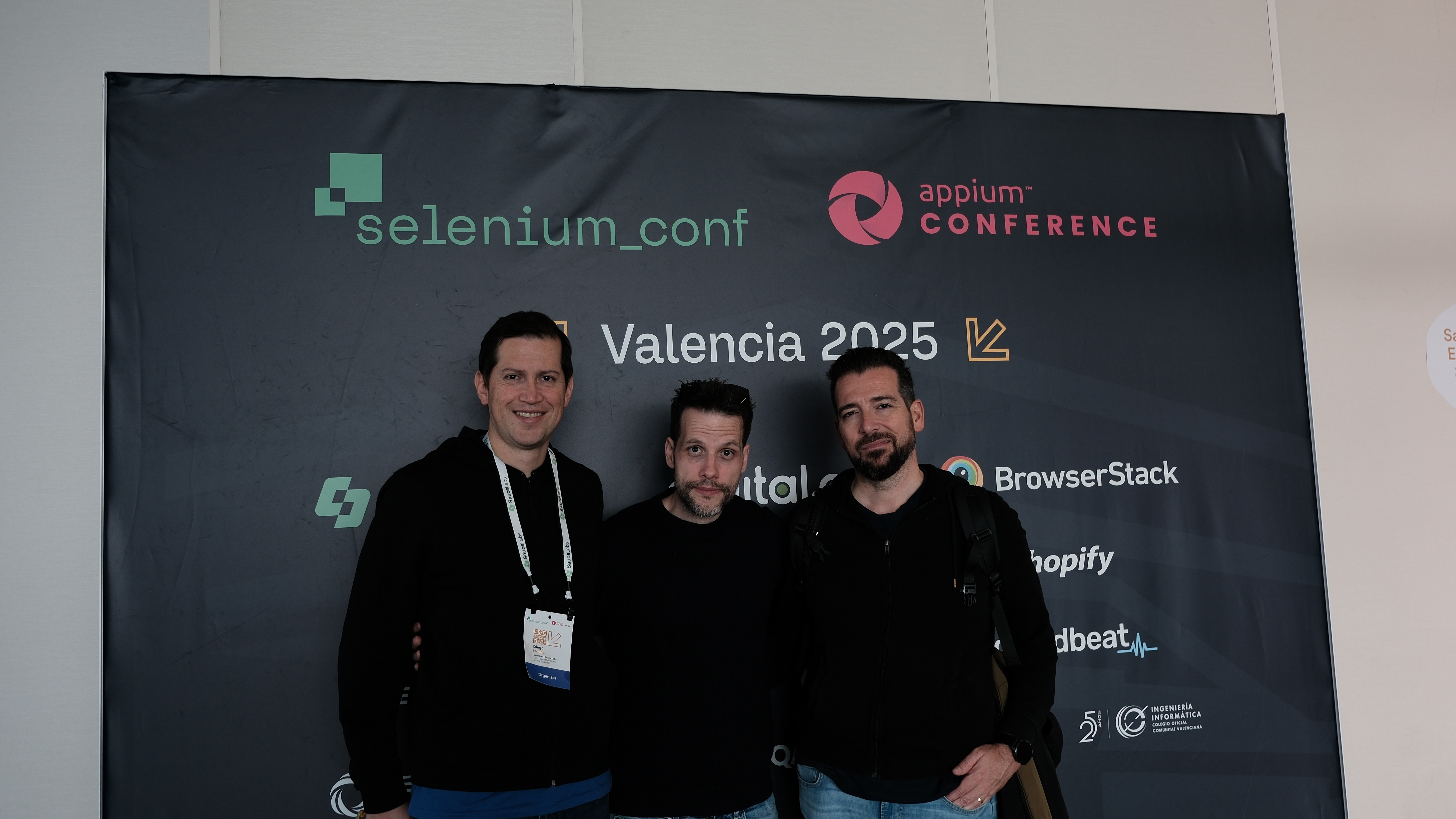 Diego Molina, Jesús, and a third smiling attendee pose together in front of the Selenium Conf and Appium Conference 2025 banner in Valencia, just after the event wrapped up.
