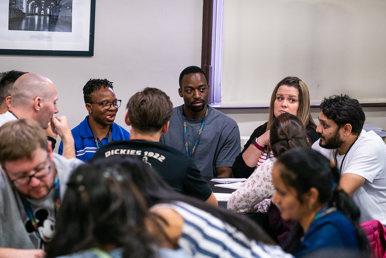 A group of people learning around a table