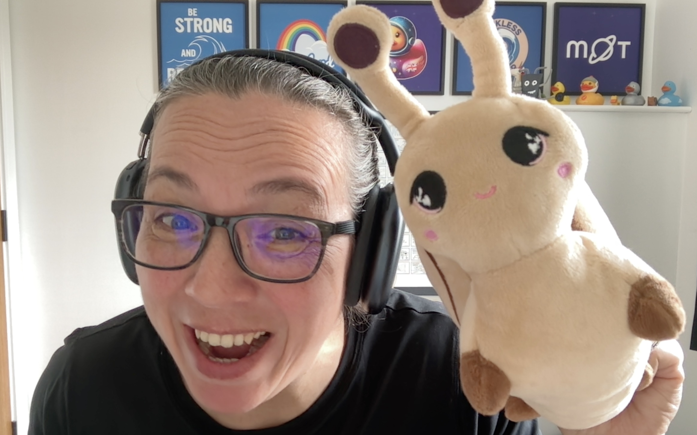 A selfie of Rosie Sherry and a soft cuddlly toy snail.